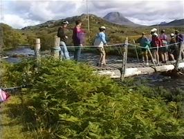 Investigating an unusual rope bridge across the river Kerry